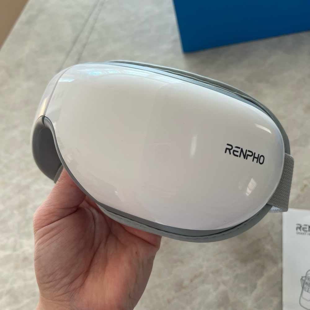 Like new. Vibrating, heating eye massager